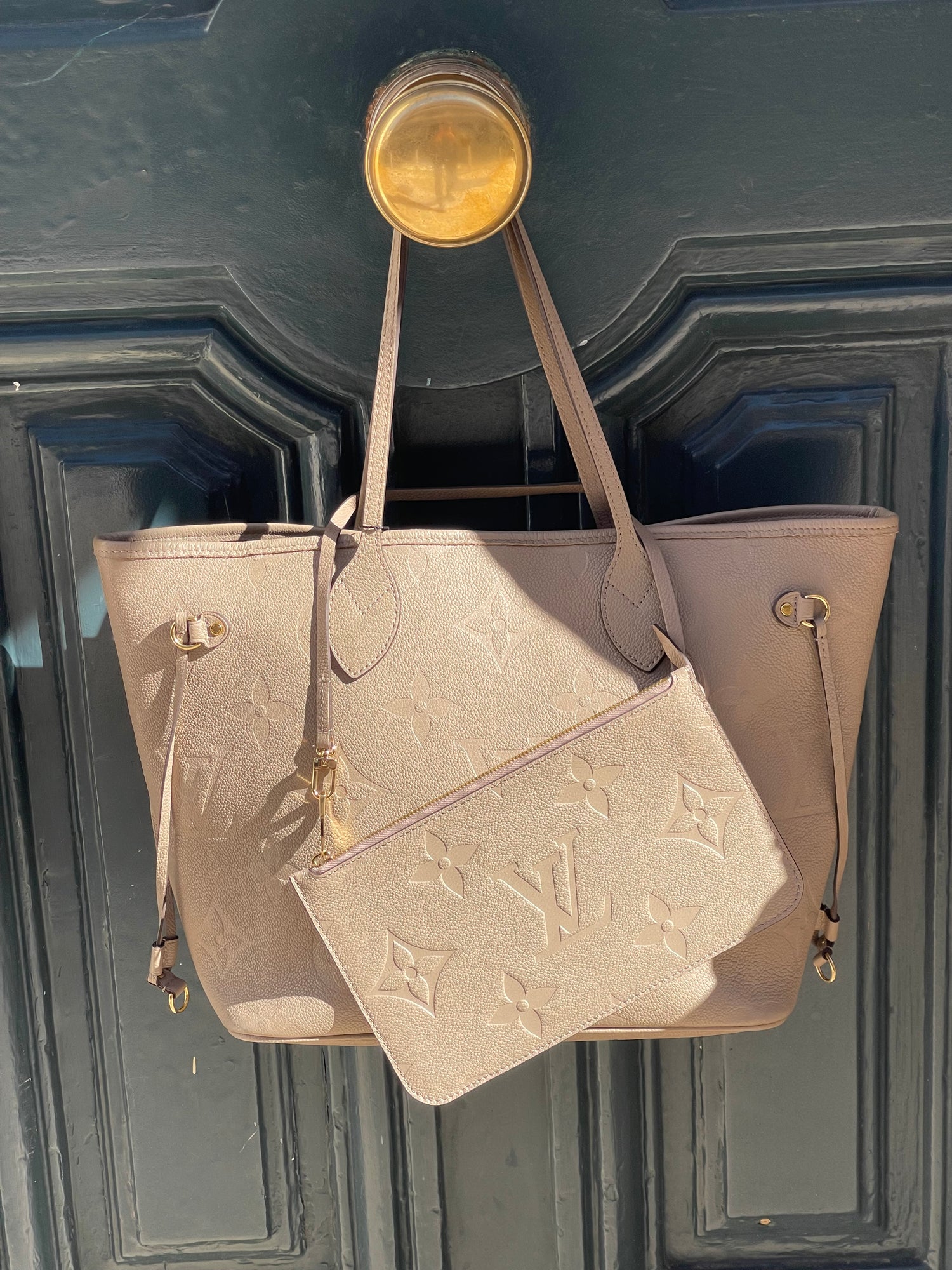 Louis Vuitton - Sac Neverfull MM cuir empreinte taupe