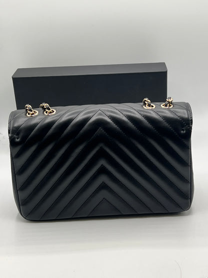 Chanel - sac à rabat cuir chevron noir