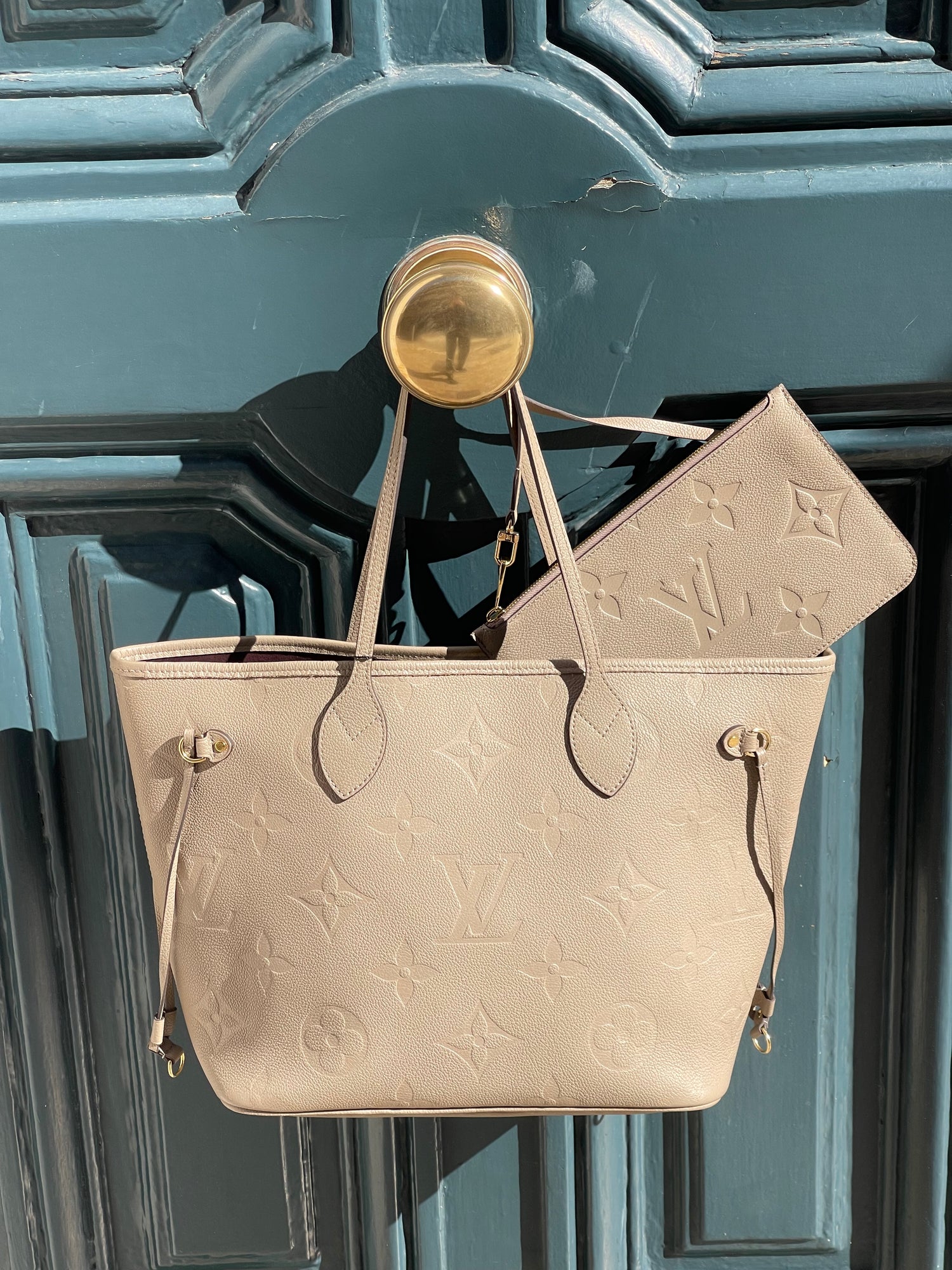 Louis Vuitton - Sac Neverfull MM cuir empreinte taupe