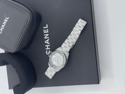 Chanel - Montre J12 33mm lunette bleu ciel