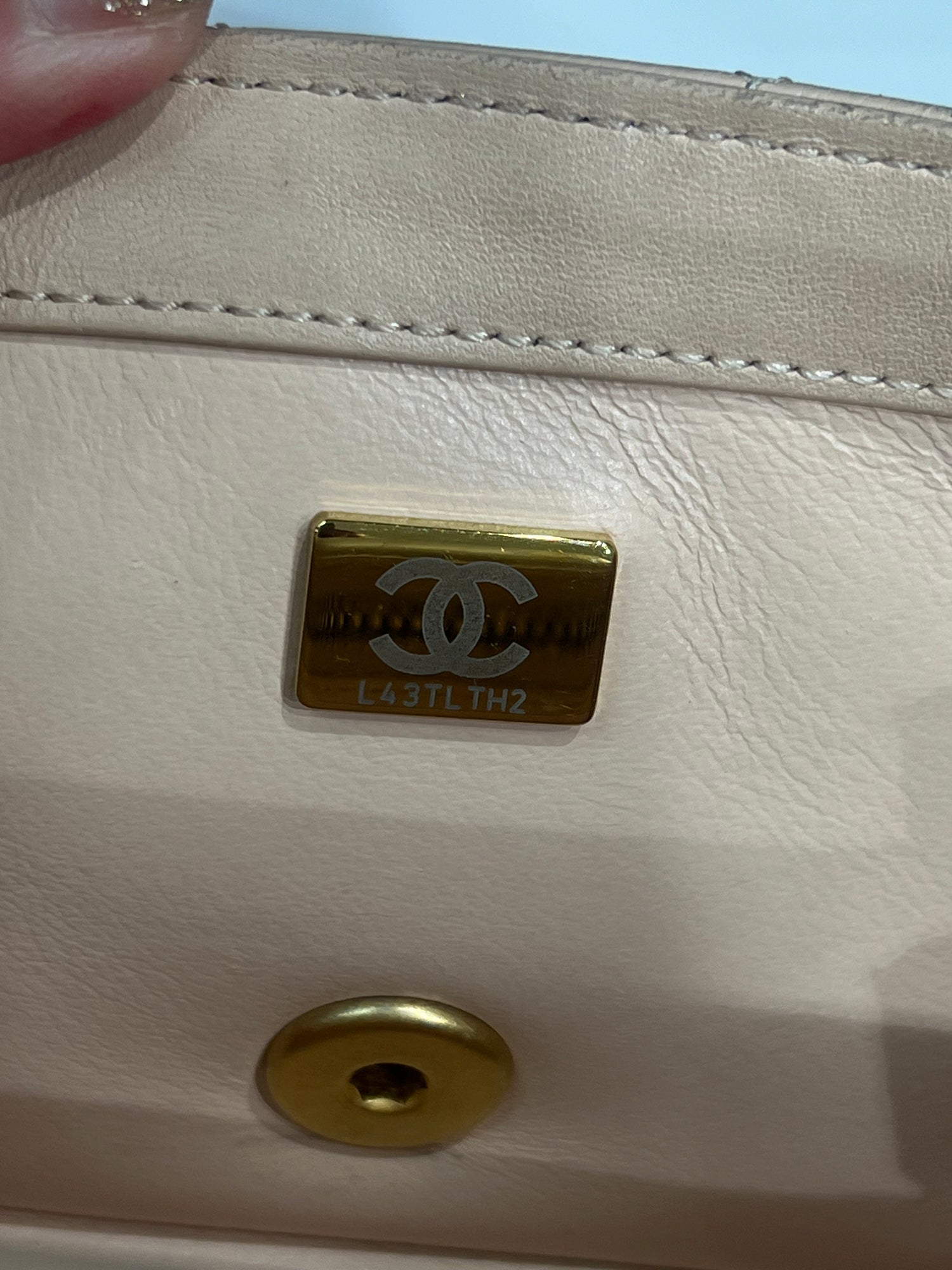 Chanel - mini sac à Rabat cuir nude chaîne rétractable