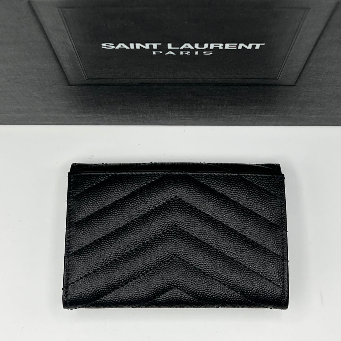 Saint Laurent - portefeuille Cassandre noir YSL doré