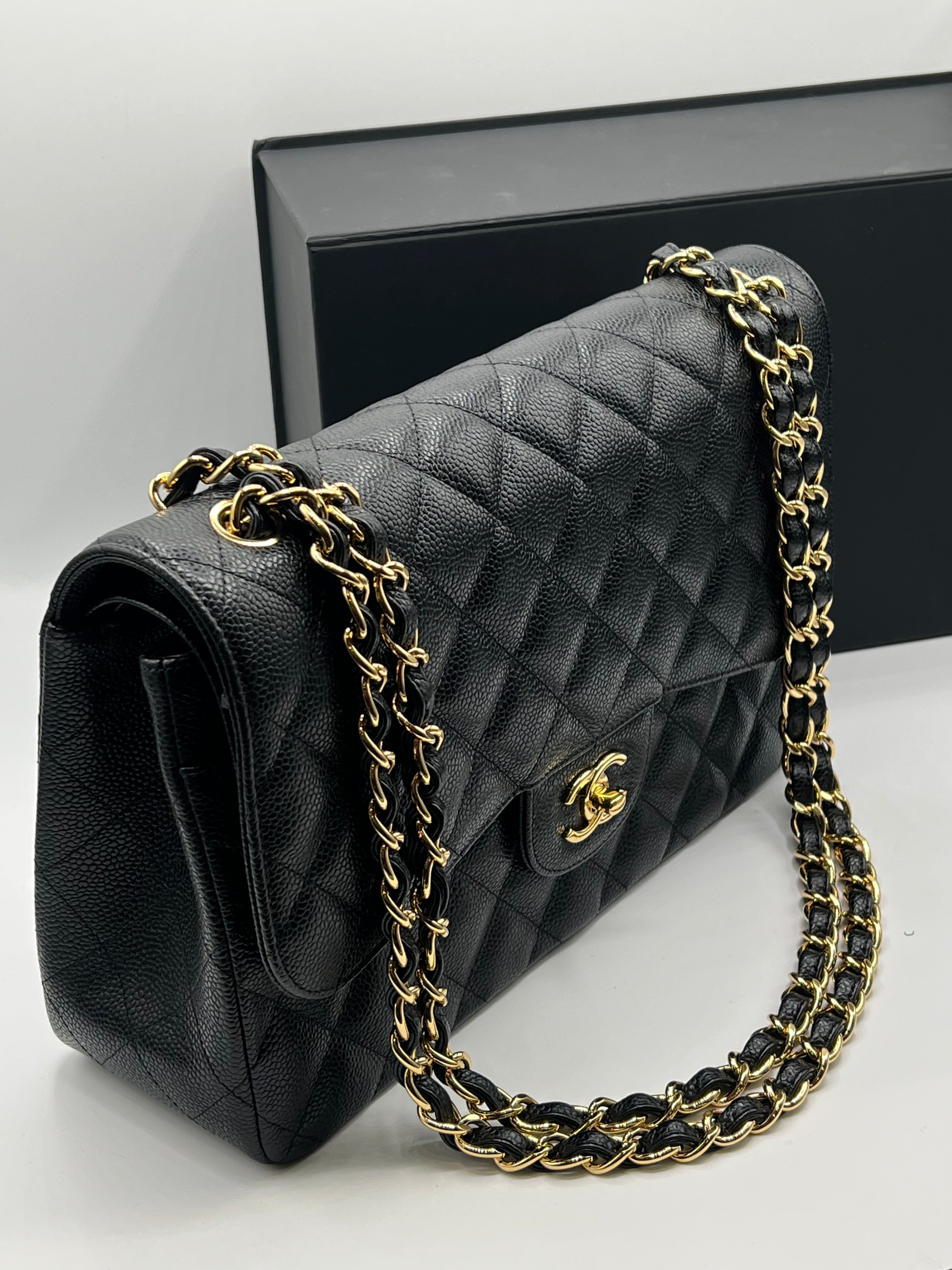 Chanel - sac jumbo cuir caviar noir