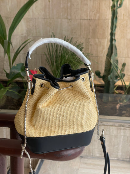 Bvlgari - serpenti leather and raffia bucket bag