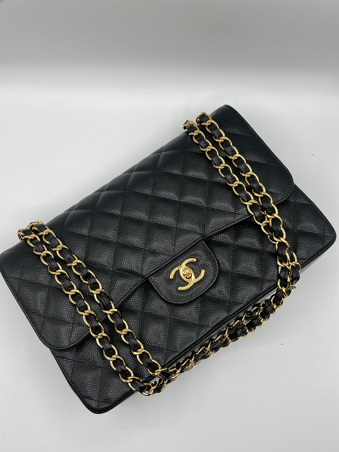 Chanel - sac jumbo cuir caviar noir