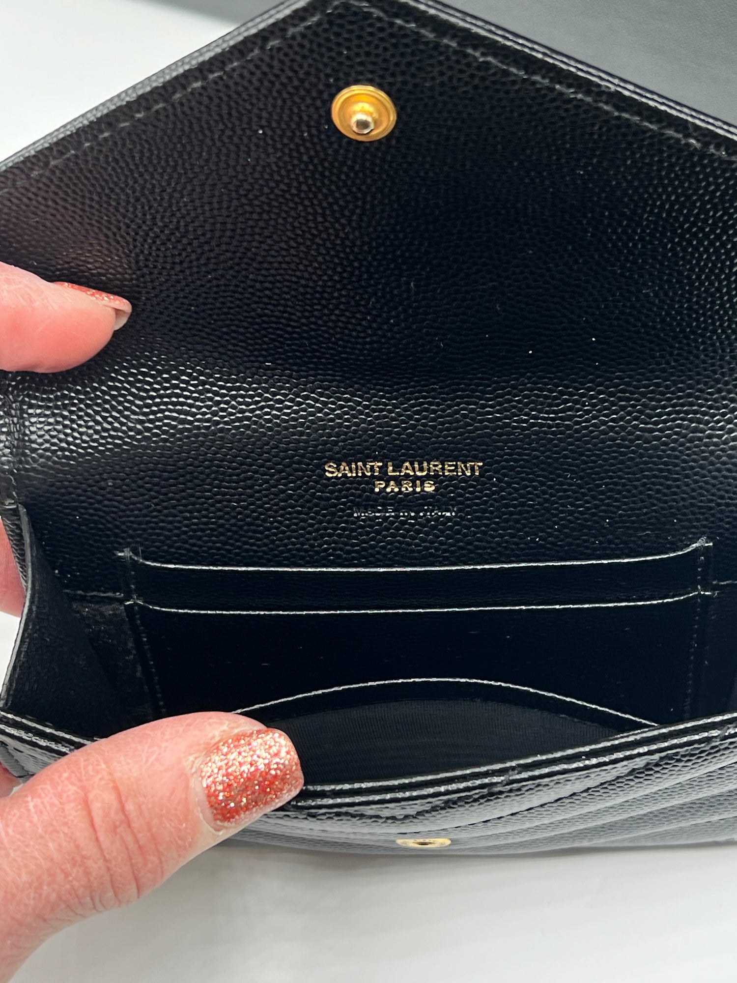 Saint Laurent - portefeuille Cassandre noir YSL doré