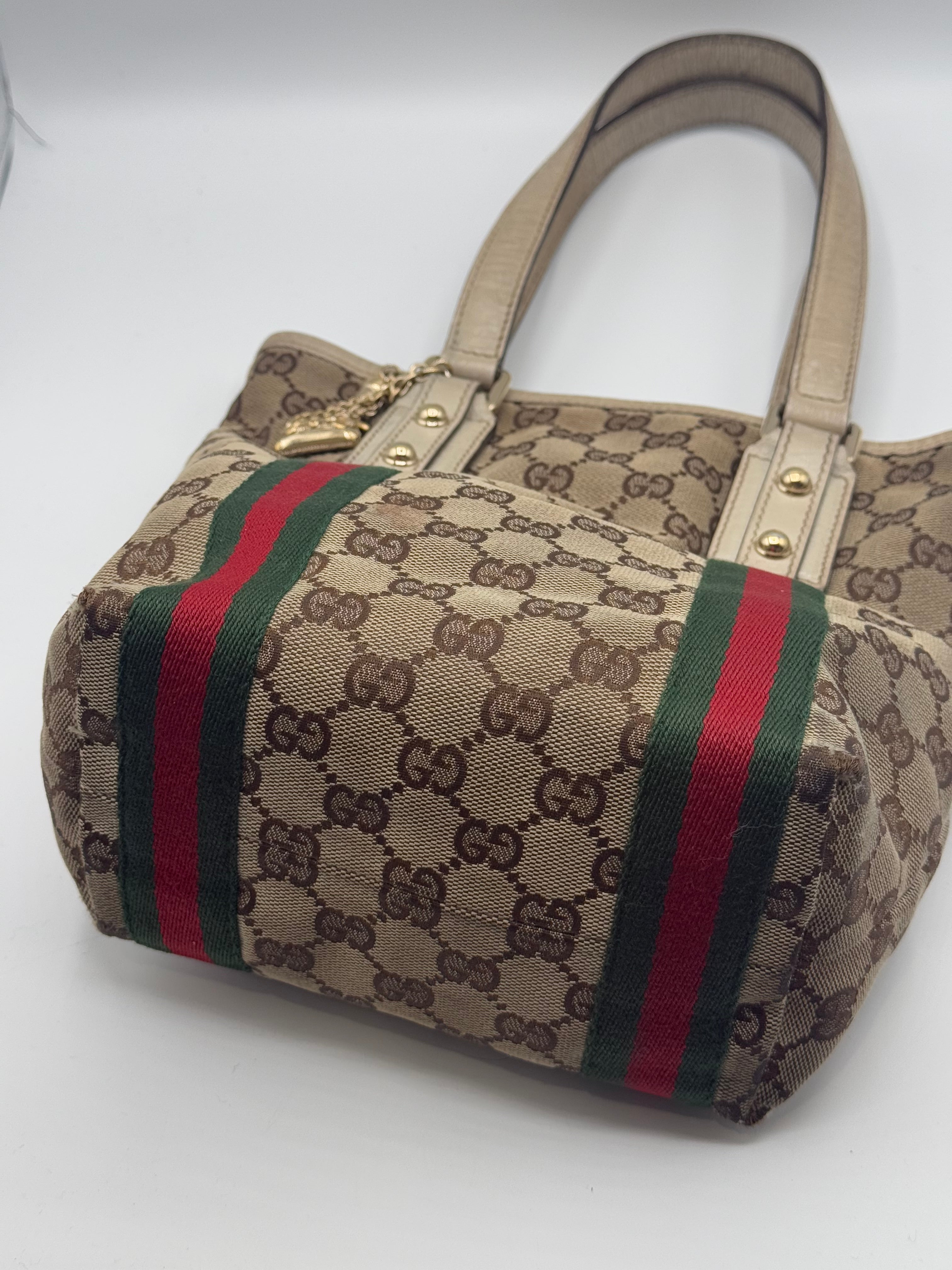 Gucci - sac seau monogramme et charm