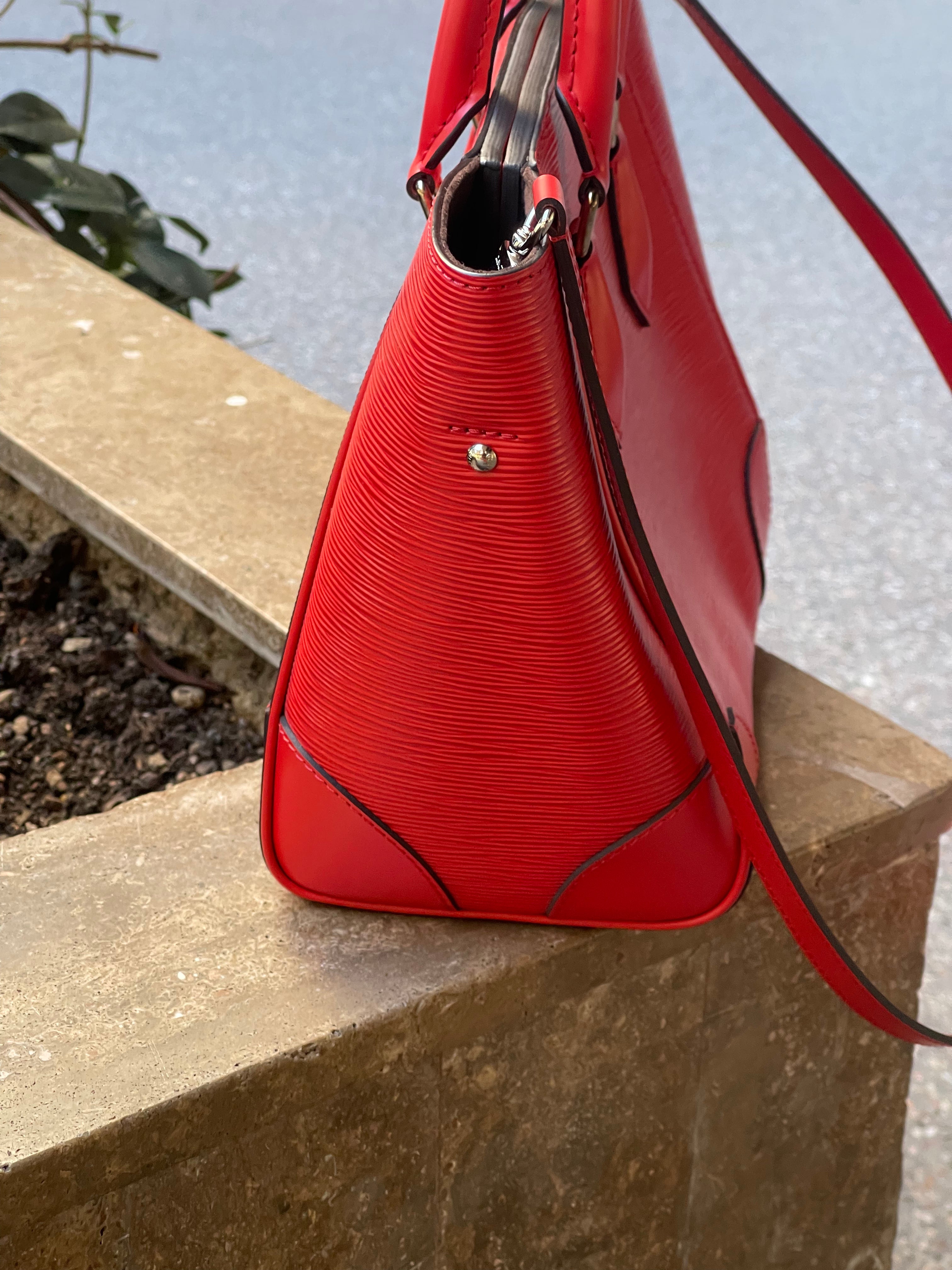 Louis Vuitton - Phenix bag in red epi leather