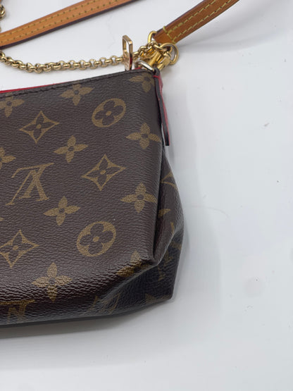 Louis Vuitton - Sac pochette Pallas monogramme et cuir rouge