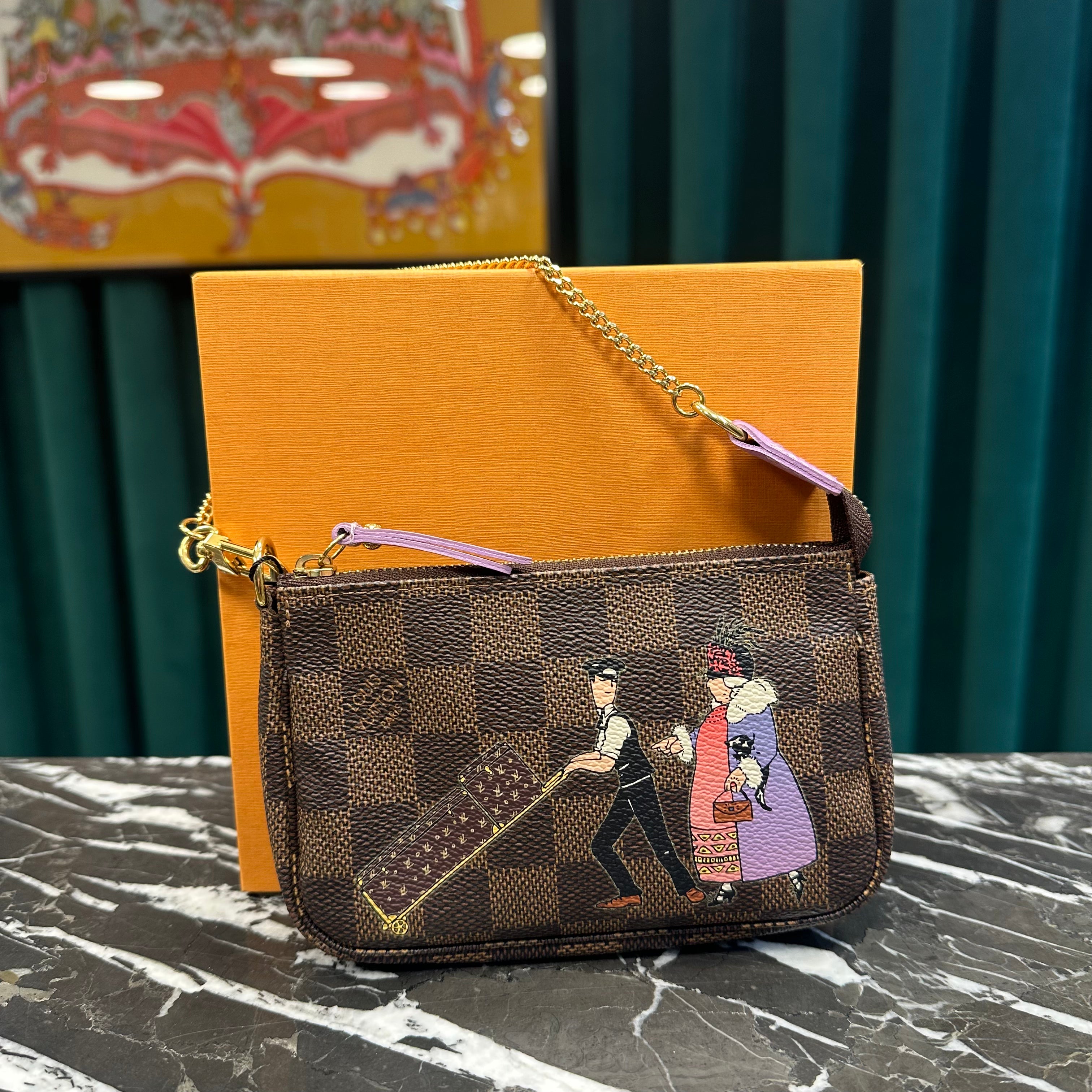 Louis Vuitton - Pochette Mini Accessoires