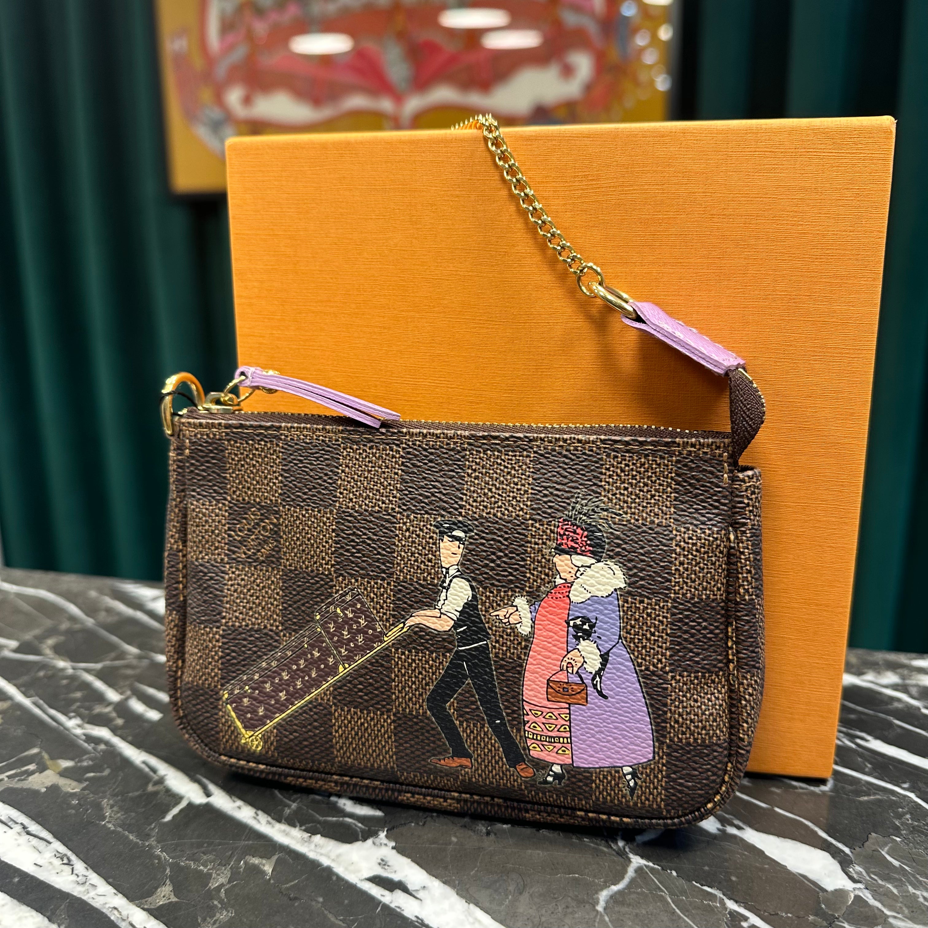 Louis Vuitton - Pochette Mini Accessoires