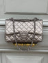 Chanel - Sac 11.12 Jumbo bronze irisé - Les Folies d&