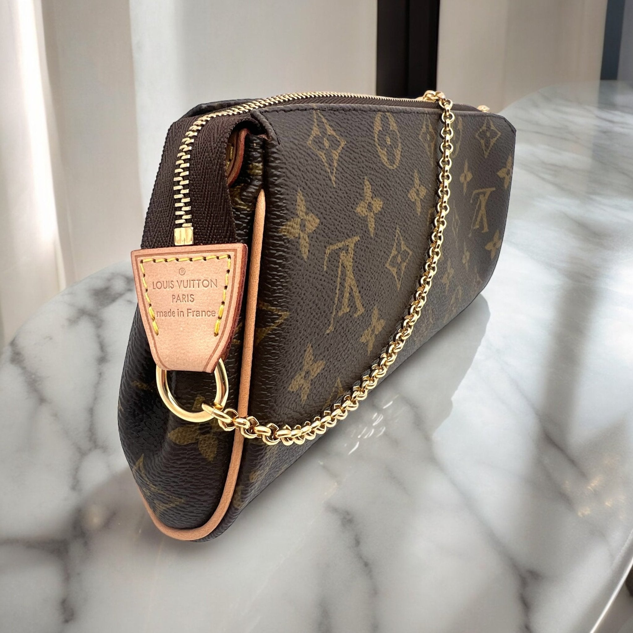 Louis Vuitton - Eva Monogramme Double Anse Sac - Les Folies d&