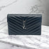 Yves Saint Laurent Cassandre enveloppe Noir M Sac - Les Folies d&