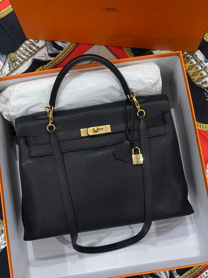 Hermès - Sac Kelly 35 retourné noir - Les Folies d&