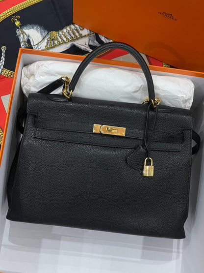 Hermès - Sac Kelly 35 retourné noir - Les Folies d&