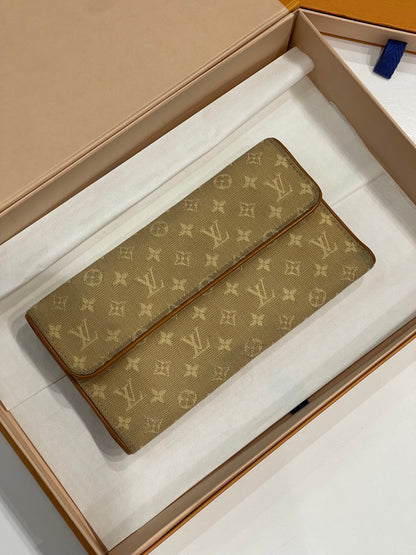 Louis Vuitton - portefeuille Lucille - Les Folies d&