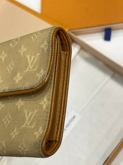 Louis Vuitton - portefeuille Lucille - Les Folies d&