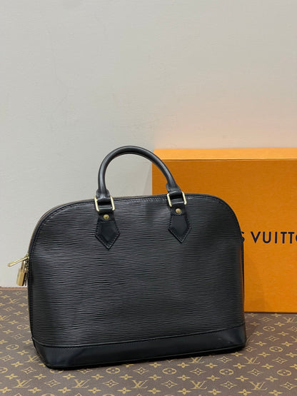 Louis Vuitton - Sac Alma MM noir épi - Les Folies d&